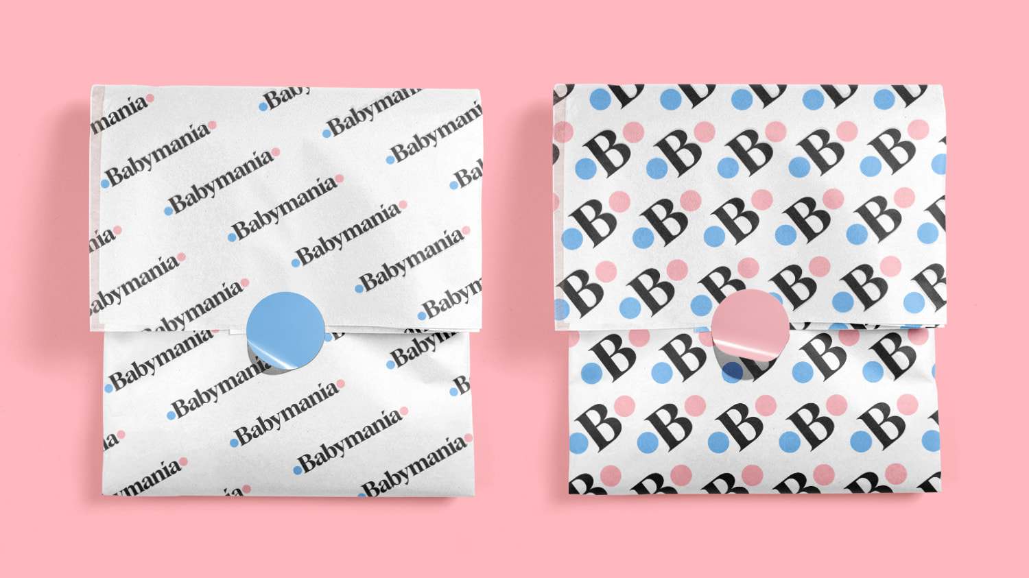 Two wrapping paper designs with Babymania logo patterns printed across paper