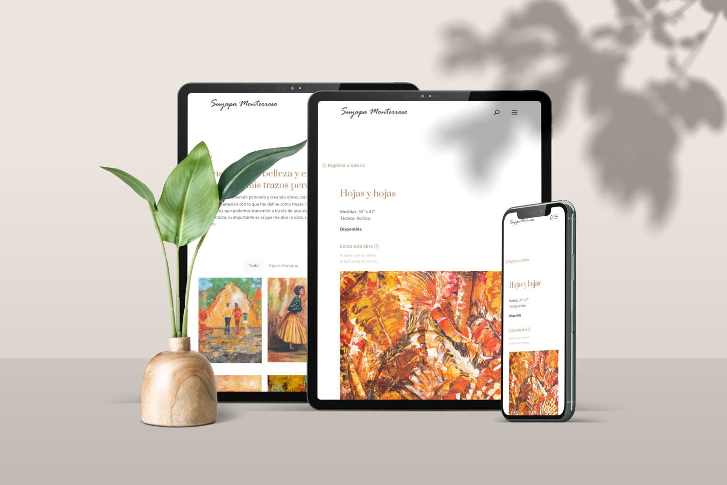 Two tablets and an iphone standing upright showing Suyapa Monterroso Website design and a plant decoration in the front
