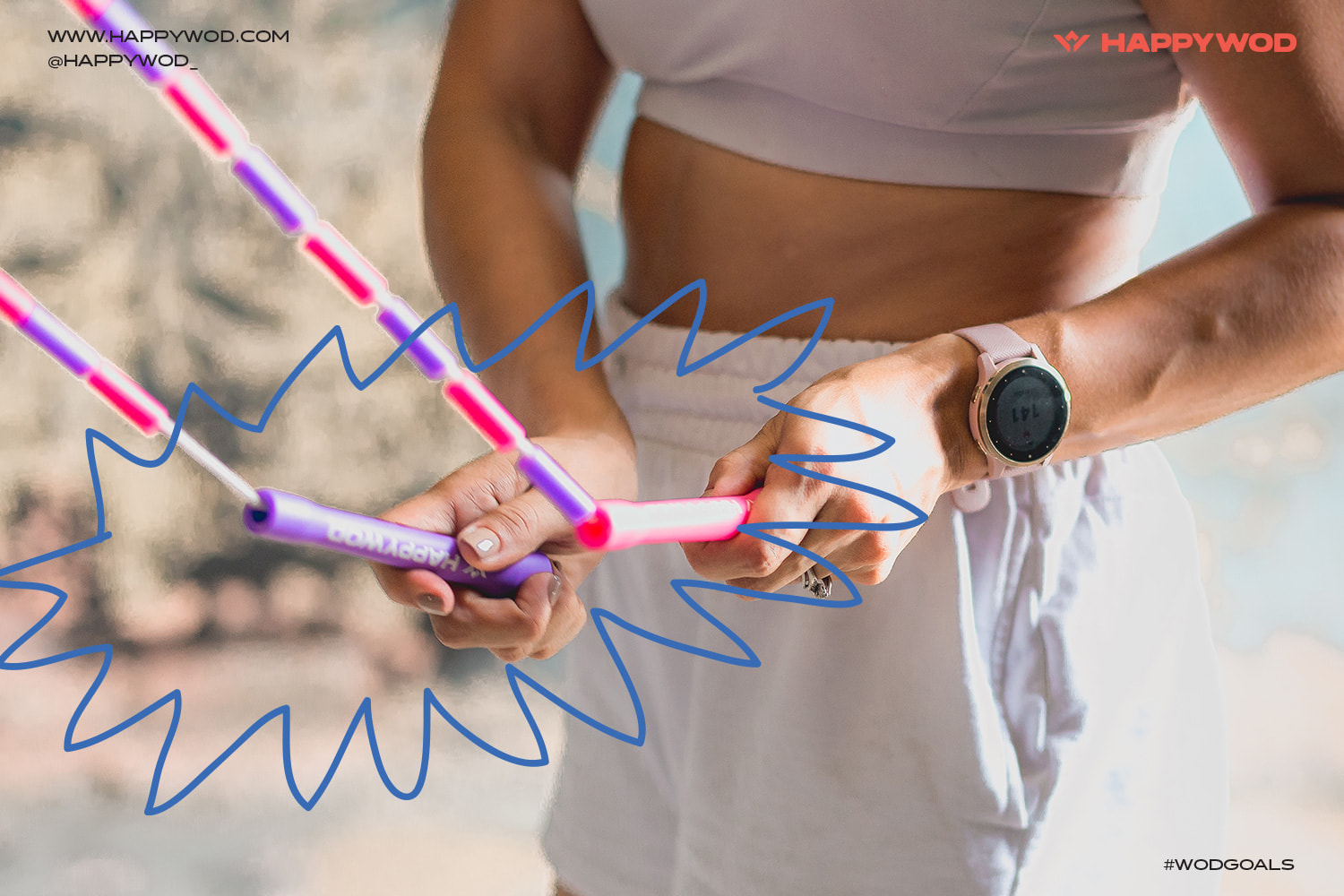 Close up of woman swinging beaded pink and purple HappyWOD jump rope